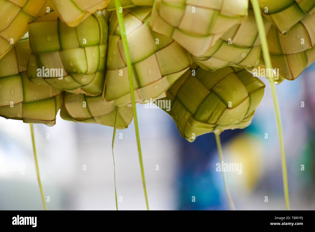 Ketupat 'asian rice dumpling'. Ketupat is a natural rice casing made from young coconut leaves for cooking rice during eid Mubarak Eid ul Fitr Stock Photo
