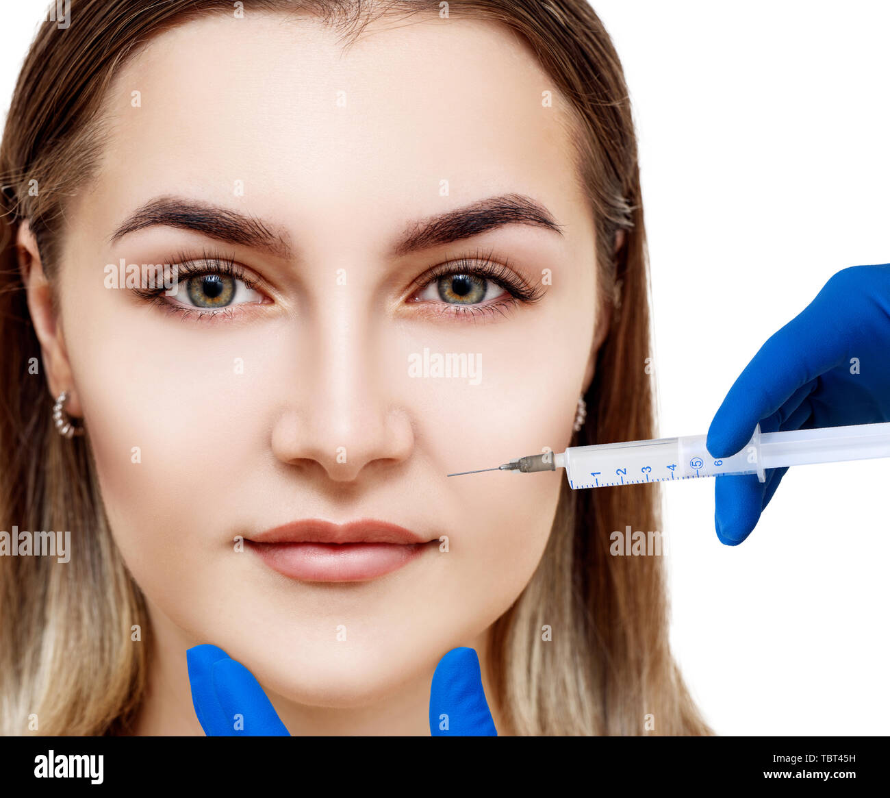 Young woman getting cosmetic medicine hi-res stock photography and ...