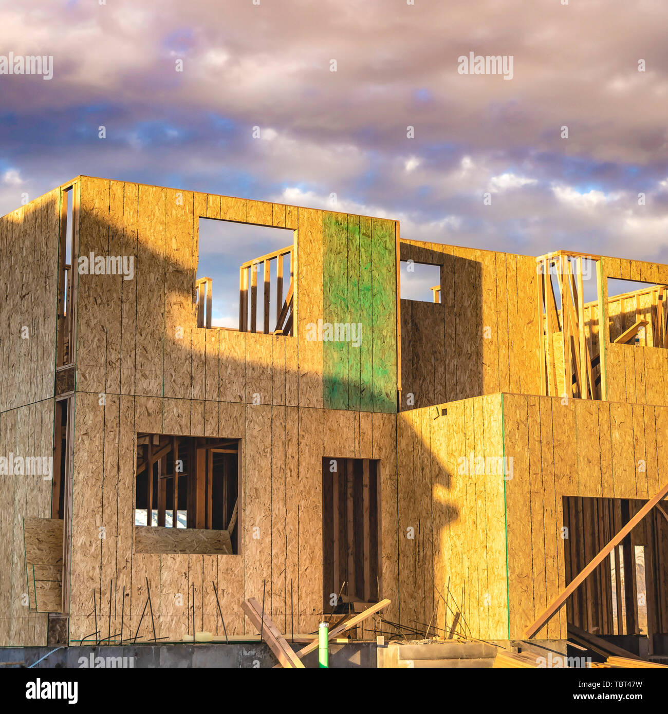 Square Framework of an unfinished house with no roof at a construction