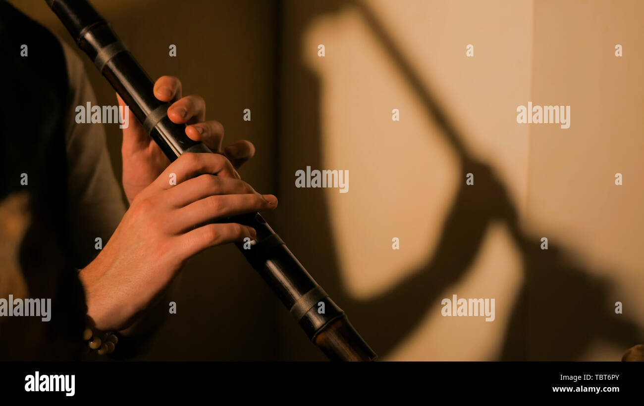 Man playing japanese bamboo flute shakuhachi Stock Photo Alamy