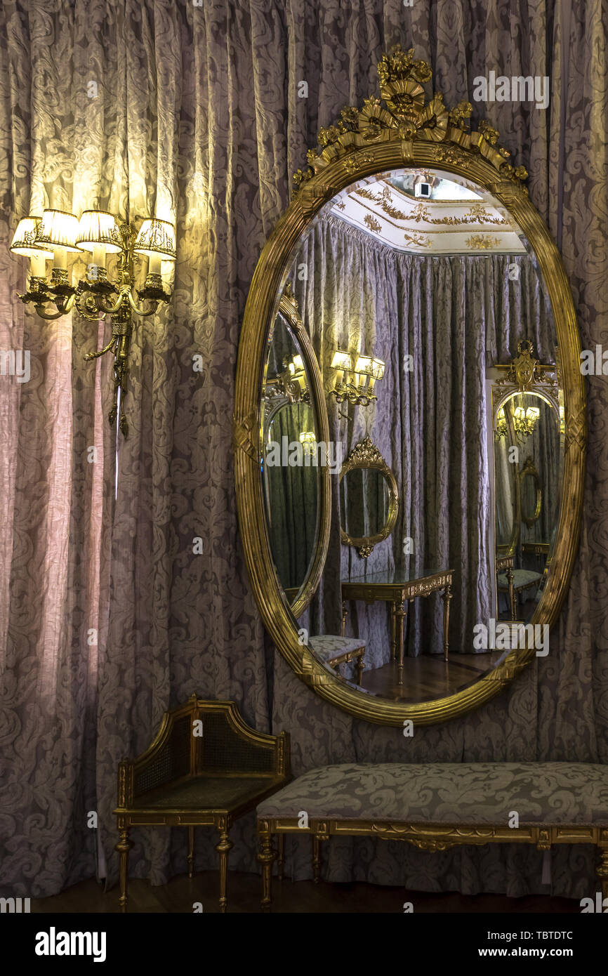 Classic room reflected in a mirror Stock Photo