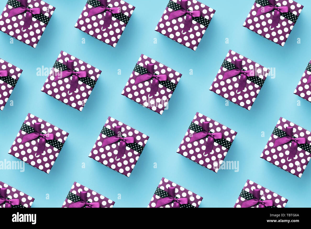 Multiple gift boxes over blue background, top view Stock Photo