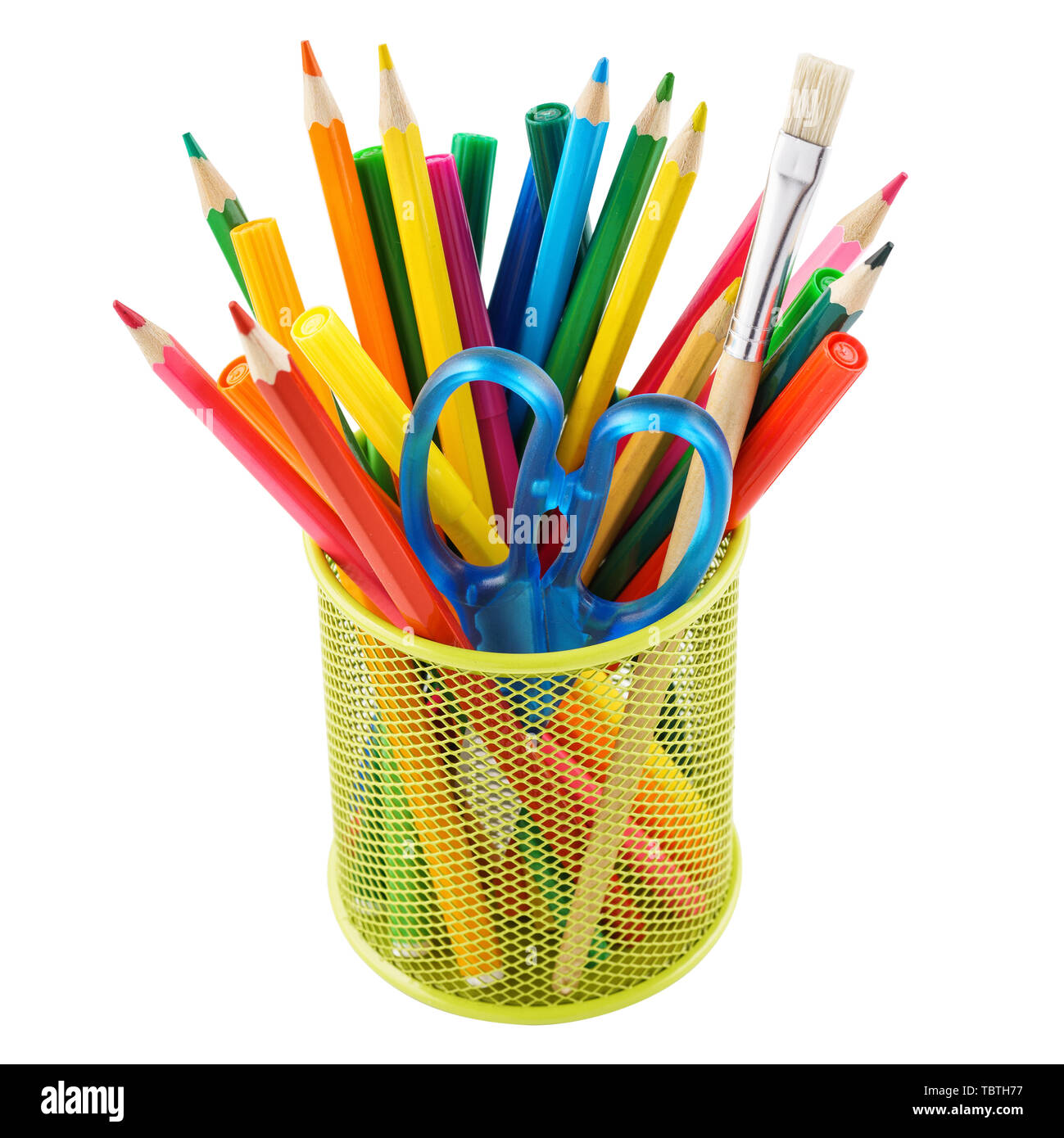 Colored pencils and various colorful stationery for school in a metal holder or cup. Isolated on white. Stock Photo