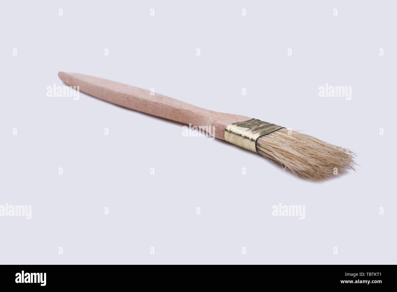 Paint brush with natural bristle. New paint brush isolated on white