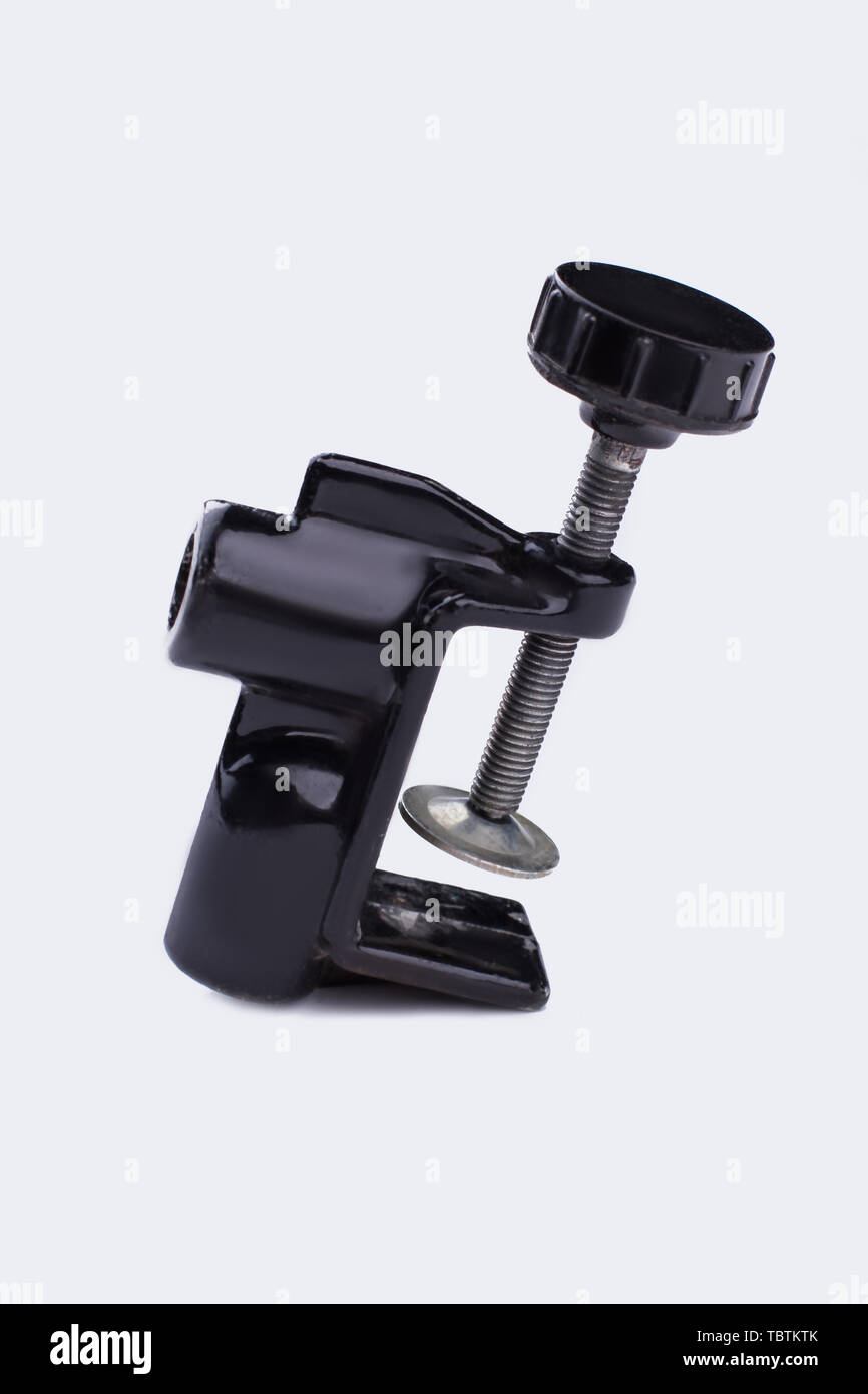 Industrial cclamp on white background. Black iron c clamp isolated on