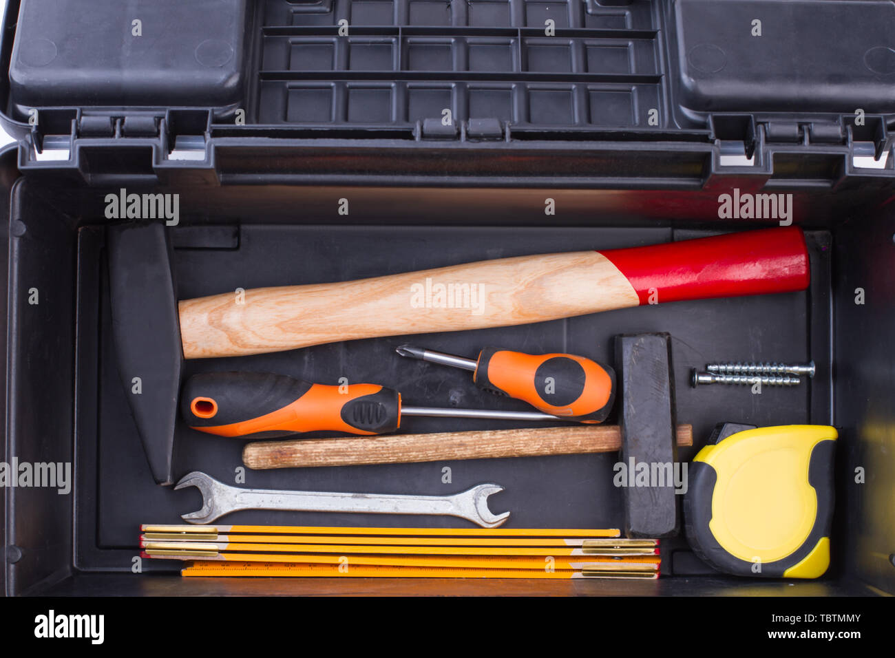 Set of building tools in black box. Tool set including hammer