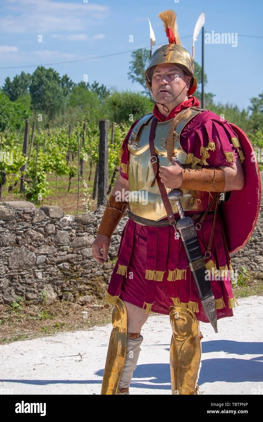 LUNI, MASSA CARRARA, ITALY – JUNE 2, 2019: Community event, Ancient Rome reenactment near Portus Lunae, genuine ancient settlement. Centurian. Stock Photo