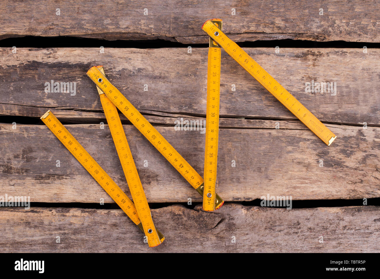Wood yardstick hi-res stock photography and images - Alamy