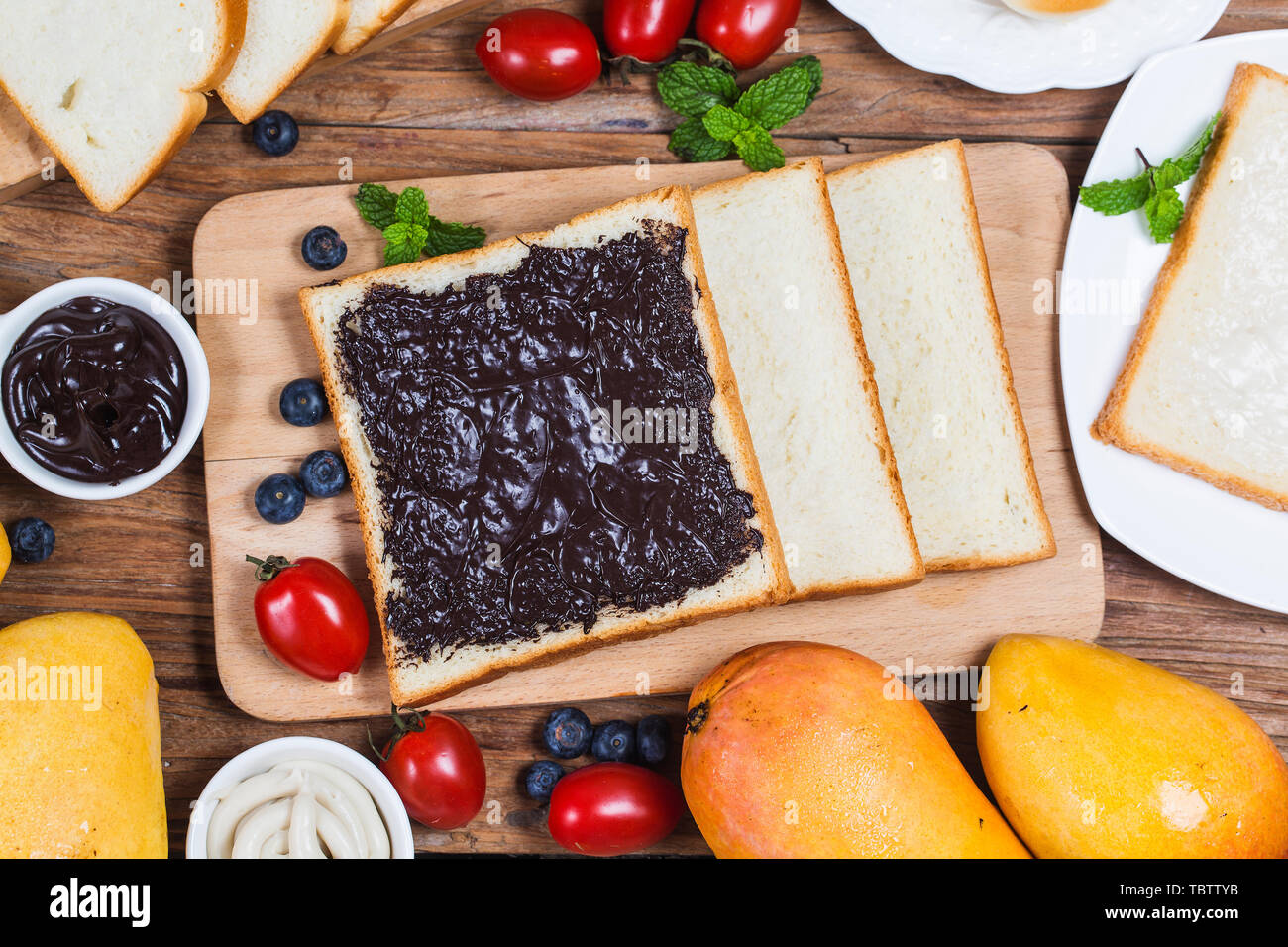 Fruit and bread,hearty breakfast,Chocolate sauce bread Stock Photo Alamy