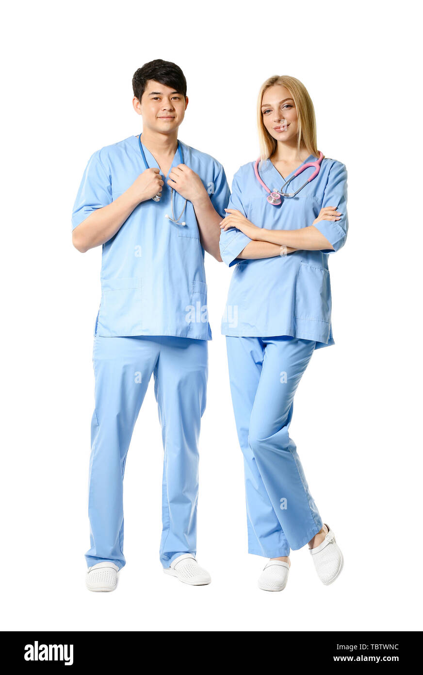 Portrait of medical assistants on white background Stock Photo Alamy