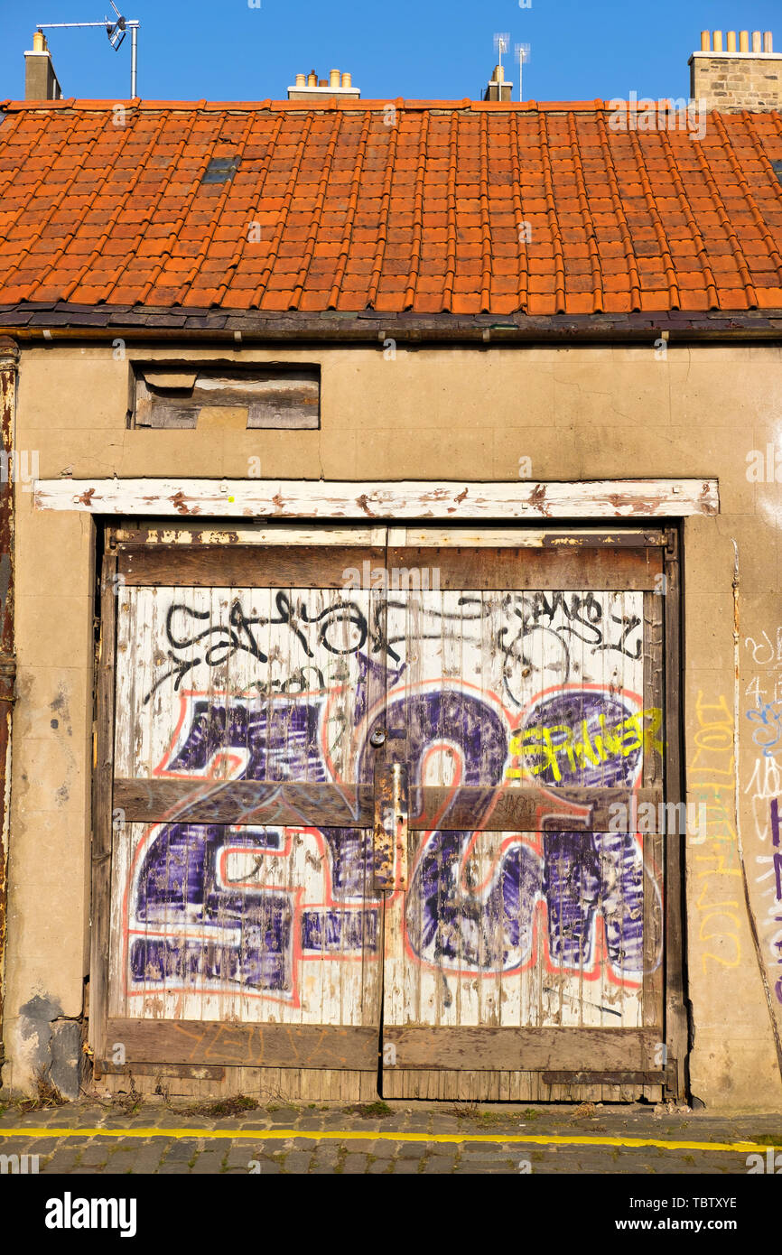 Graffiti on old garage doors, Edinburgh, Scotland Stock Photo Alamy
