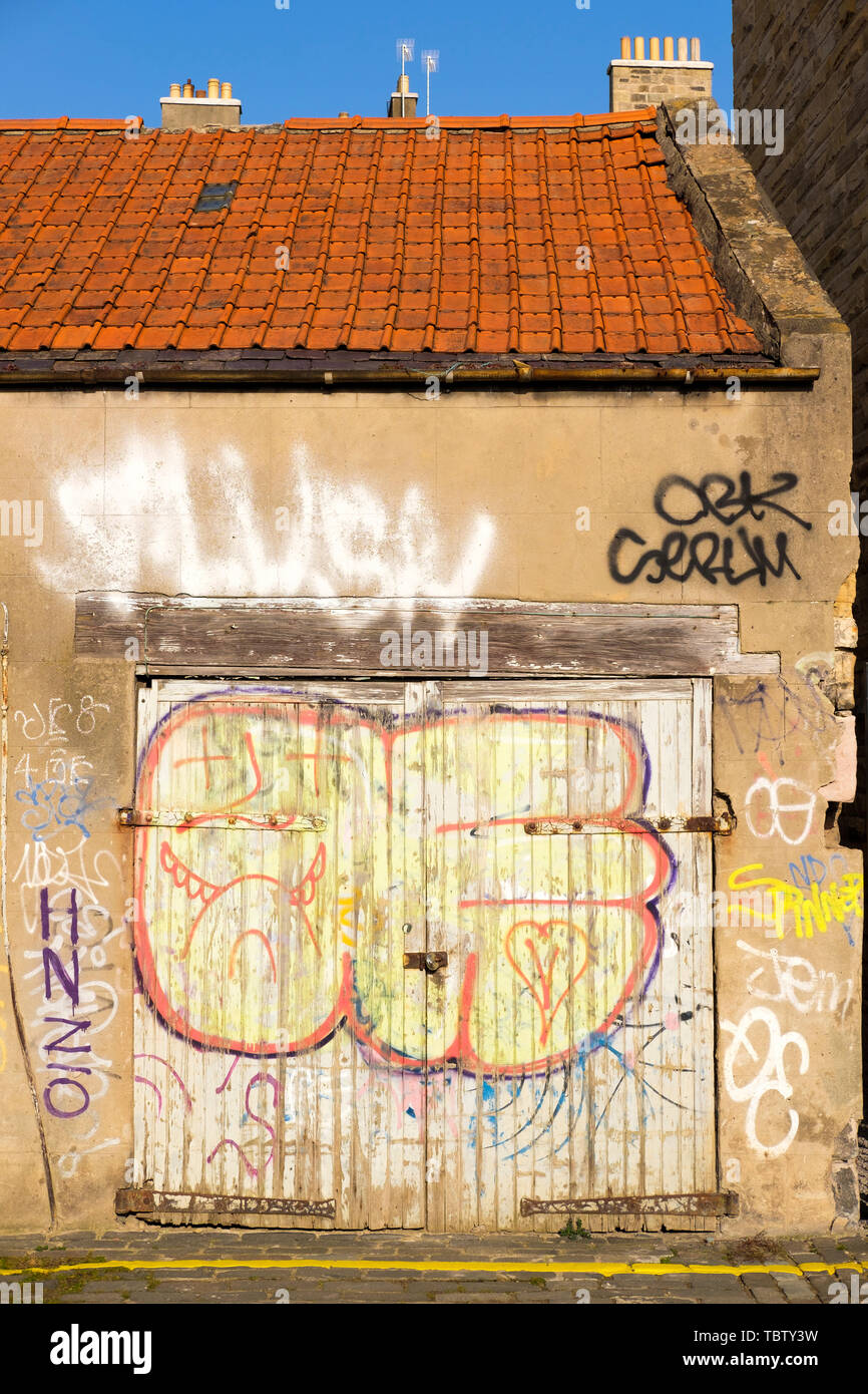 Graffiti on old garage doors, Edinburgh, Scotland Stock Photo Alamy