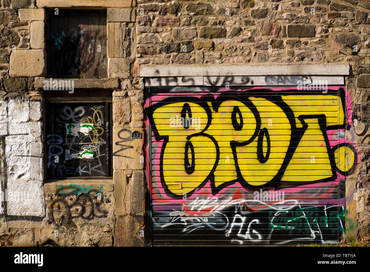 Graffiti on old garage doors, Edinburgh, Scotland Stock Photo Alamy