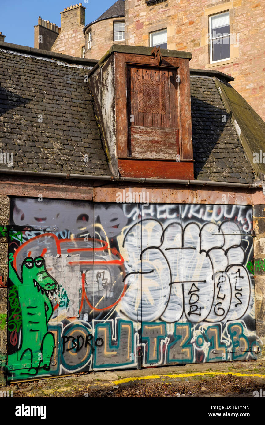 Graffiti on old garage doors, Edinburgh, Scotland Stock Photo Alamy