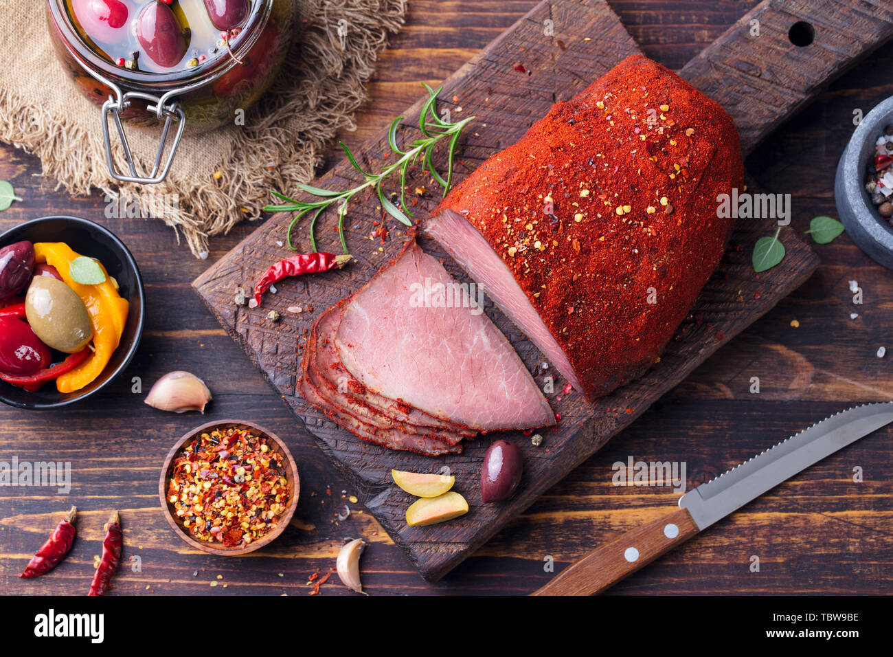Roasted beef, pastrami on slate cutting board. Top view Stock Photo Alamy