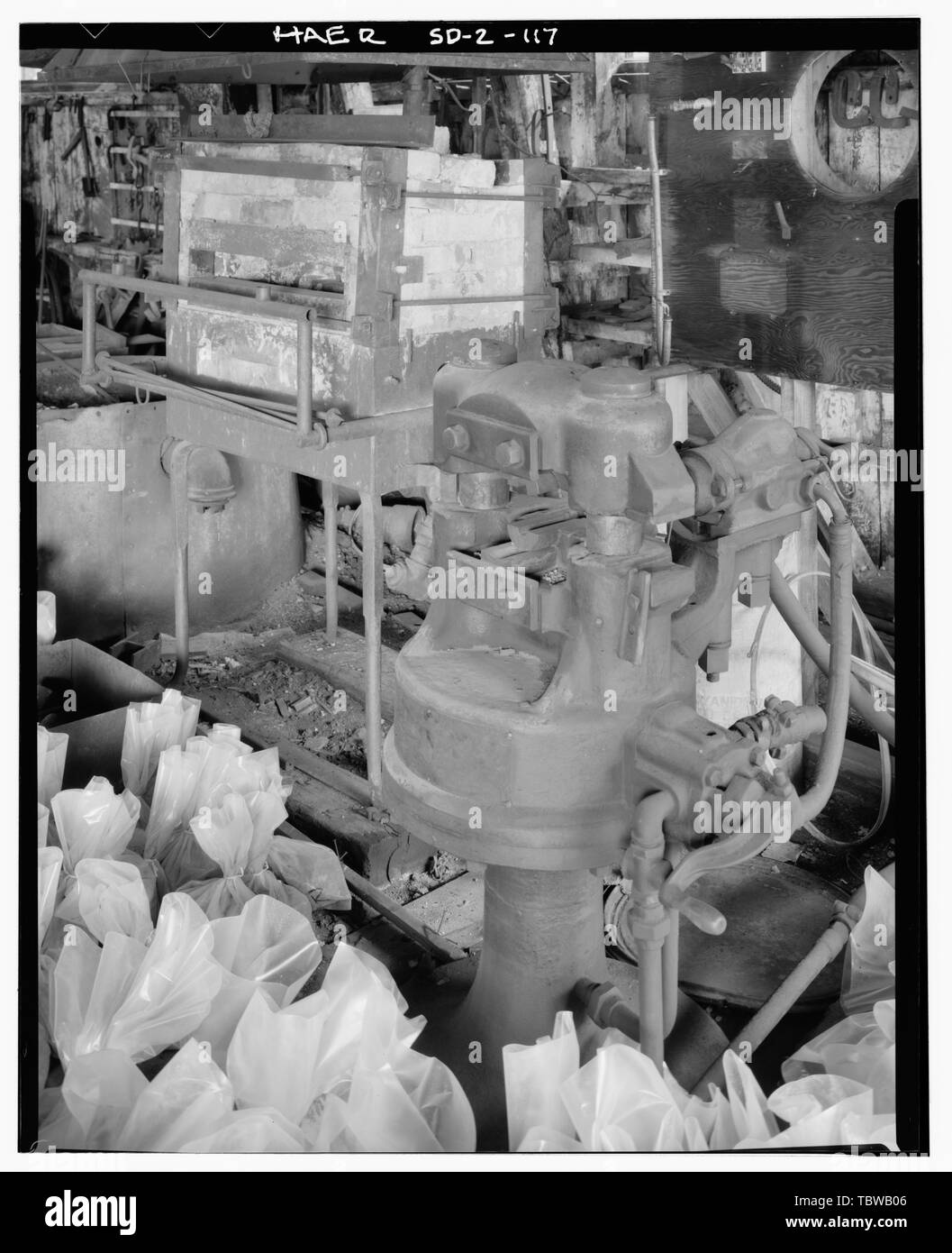 MACHINE SHOP OVEN DETAIL FROM NORTHWEST.  Bald Mountain Gold Mill, Nevada Gulch at head of False Bottom Creek, Lead, Lawrence County, SD Trojan Mining Company Bald Mountain Mining Company American Eagle Mining Company Eve, David, historian Stock Photo