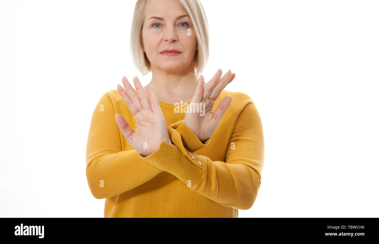 excited middle aged woman showing the sign of stop, neglect negation and reluctance Stock Photo