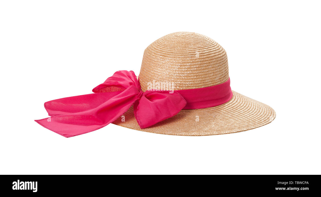 Pretty straw hat with ribbon and bow on white background. Beach hat top view isolated on white background. Stock Photo