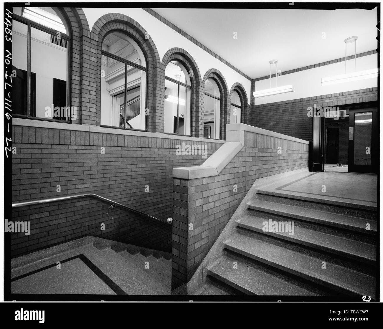 MAIN ENTRANCE STAIRCASE IN SECOND FLOOR, SHOWING DOORWAY TO WAITING ROOM ON RIGHT, AND HALLWAY ALONG OFFICES, ON LEFT, 1913 ADDITION, LOOKING SOUTHWEST  Underwriters' Laboratories, 207231 East Ohio Street, Chicago, Cook County, IL Stock Photo