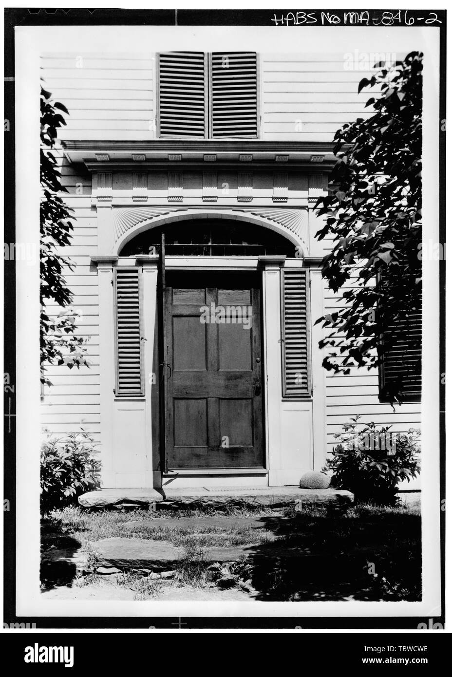MAIN ENTRANCE WITH SHUTTERED SIDELIGHTS, FANLIGHT, AND ARCHITRAVE