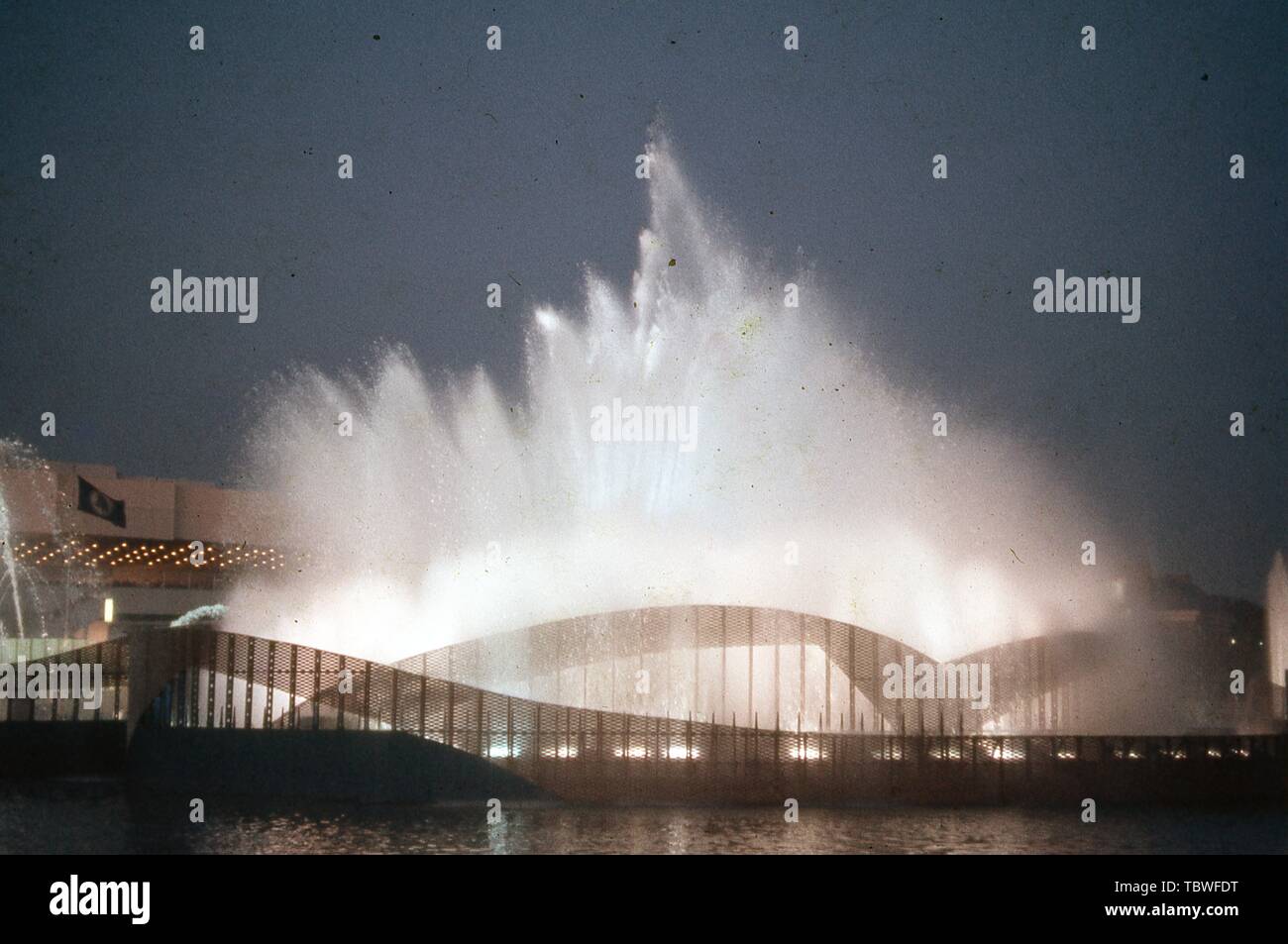 Night shot of lighted fountain plumes, 1964 New York World's Fair, Flushing Meadows Park, Queens, New York, June, 1964. () Stock Photo