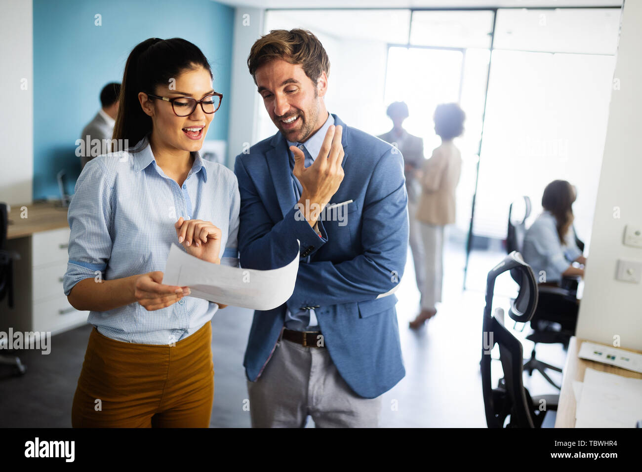 Group of successful business people at work in office Stock Photo - Alamy
