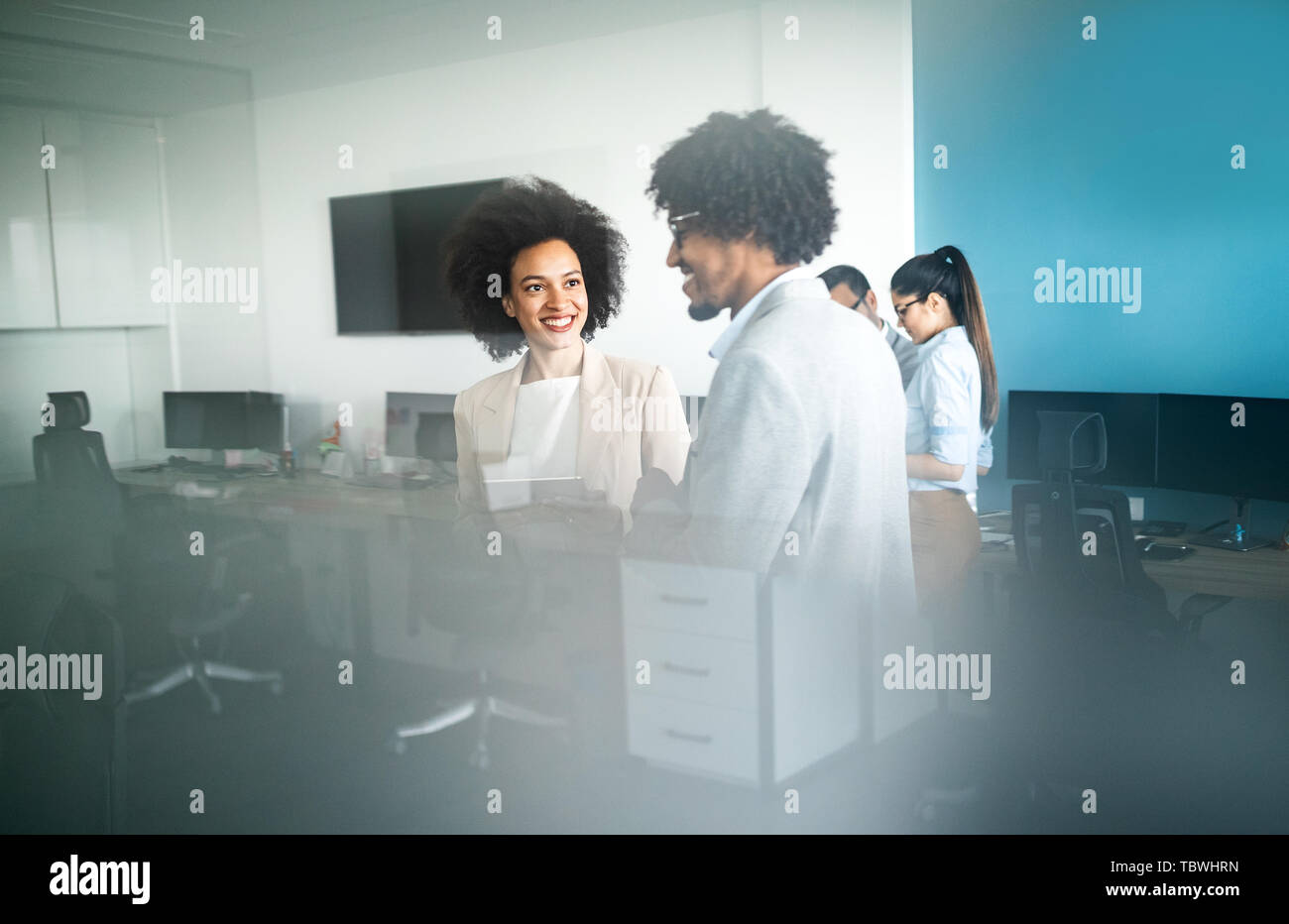 Group of successful business people at work in office Stock Photo - Alamy