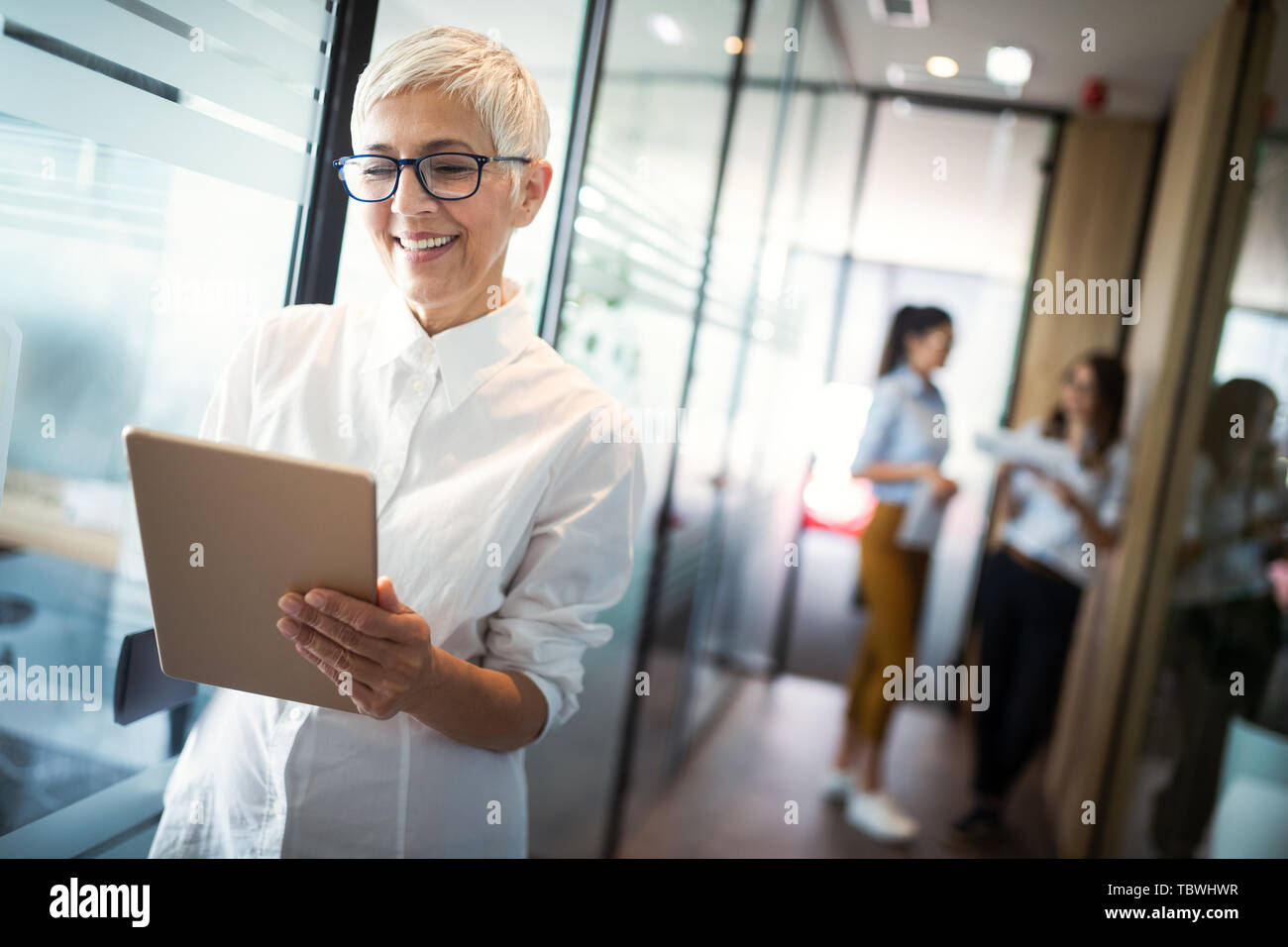 Blonde business woman mature hi-res stock photography and images - Alamy