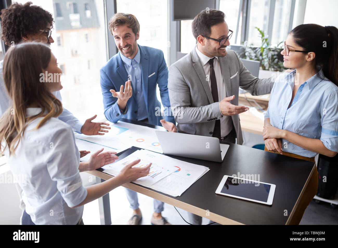 Group of successful business people at work in office Stock Photo - Alamy