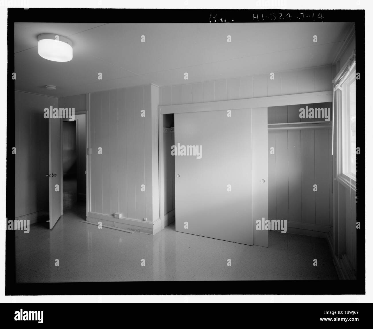 Master Bedroom Showing The Closet With Sliding Doors View Facing