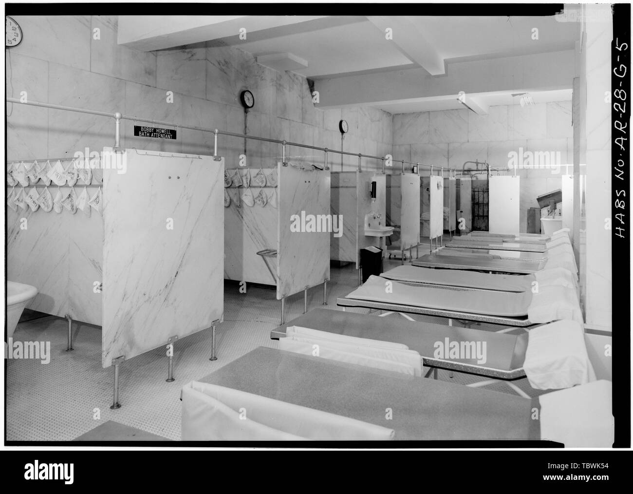 MEN'S BATH SHOWING STALLS AND COTS  Bathhouse Row, Buckstaff Bathhouse, Central Avenue, Hot Springs, Garland County, AR Stock Photo