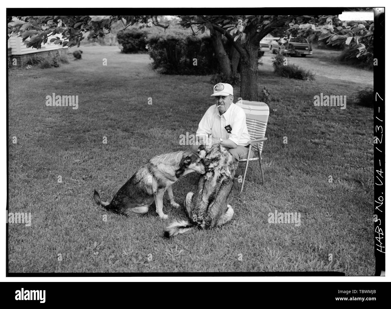 MR. WILBUR C. SWAN AND HIS DOGS (Mr. Swan is the owner of the property)  Hard Bargain (Main House), Near Routes 695, 636 and 613 vicinity, Trevilians, Louisa County, VA Morris, Scott, transmitter DeBoer, Ruth, transmitter Price, Virginia B, transmitter Stock Photo