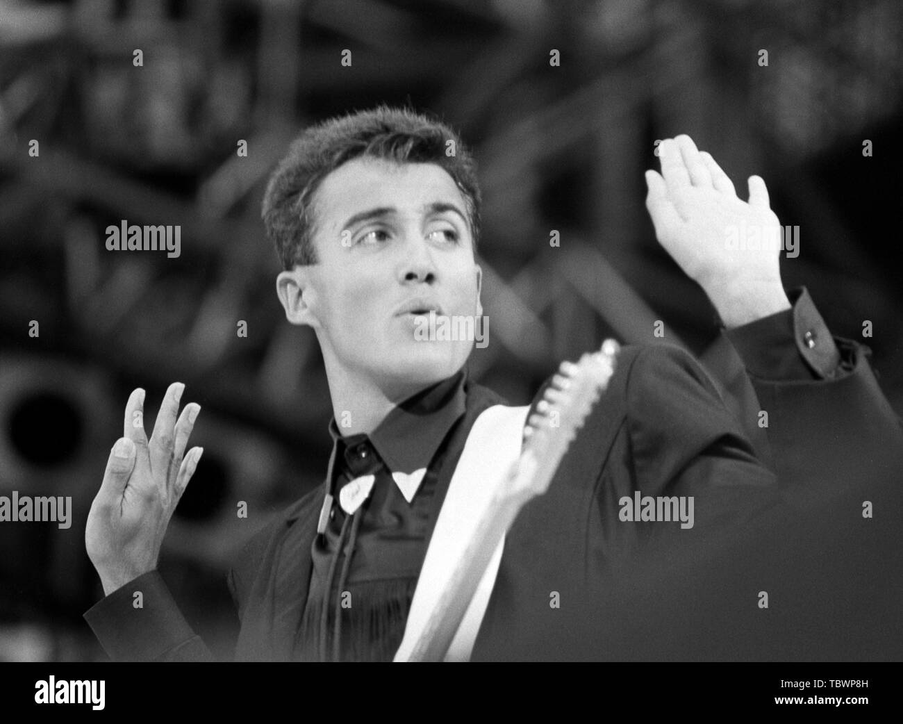 Andrew Ridgeley live on stage during Wham's farewell concert Stock