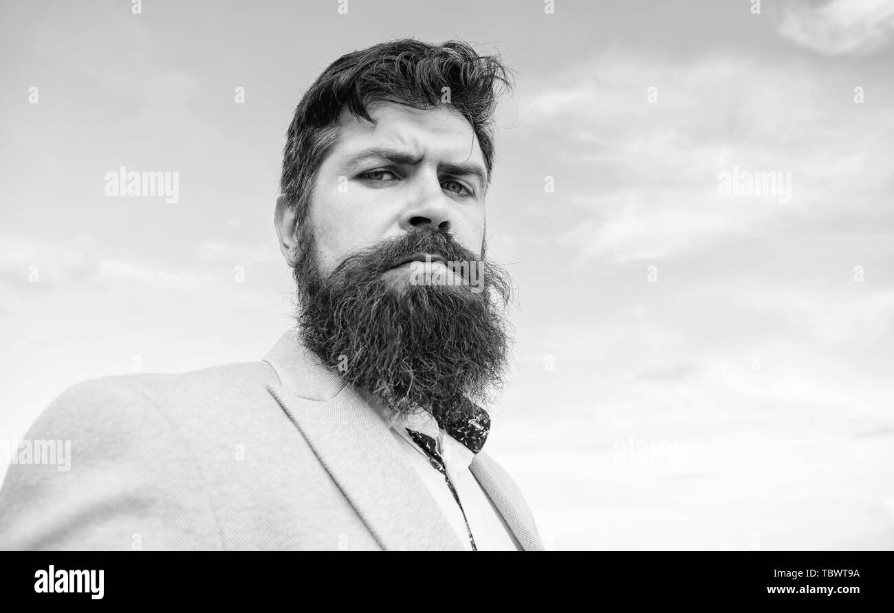 Expert tips for growing and maintaining mustache. Hipster serious handsome attractive guy with