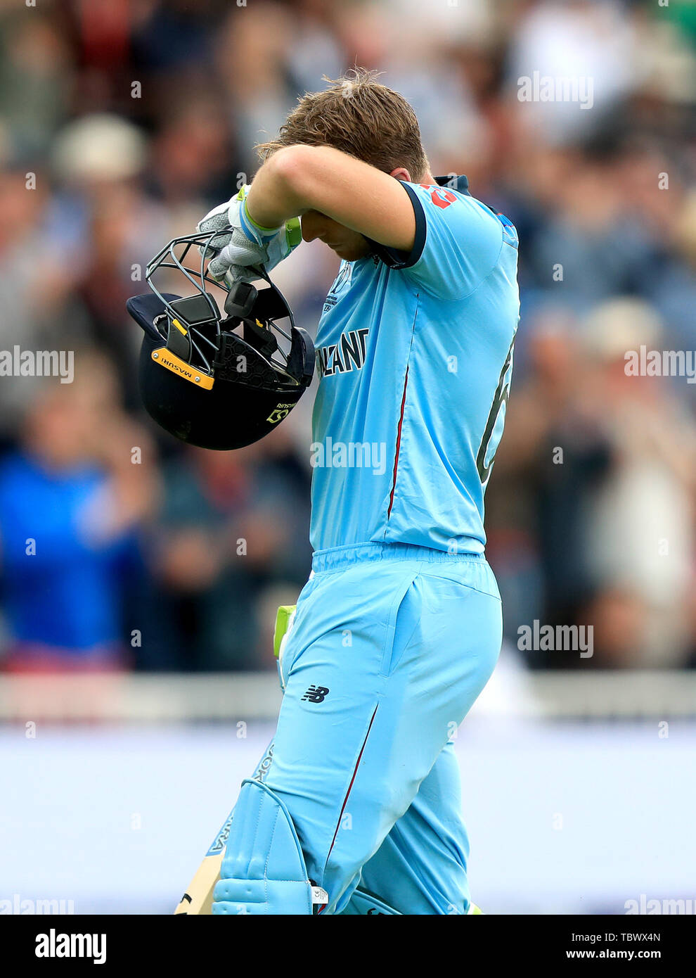 England's Jos Buttler appears dejected after being dismissed during the ICC Cricket World Cup group stage match at Trent Bridge, Nottingham. Stock Photo