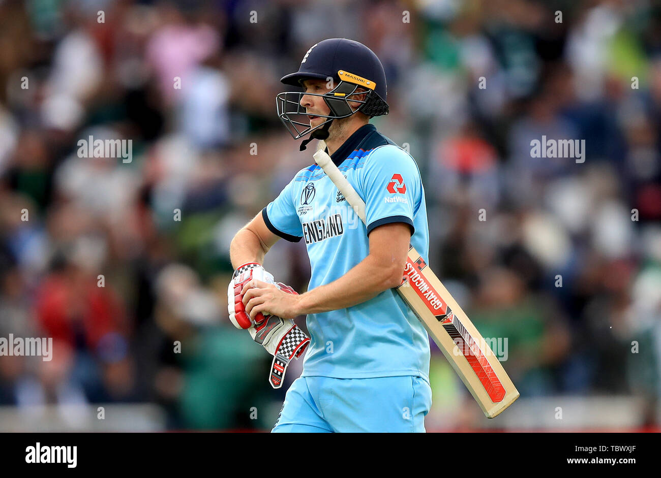 England's Chris Woakes walks off after being dismissed during the ICC Cricket World Cup group stage match at Trent Bridge, Nottingham. Stock Photo