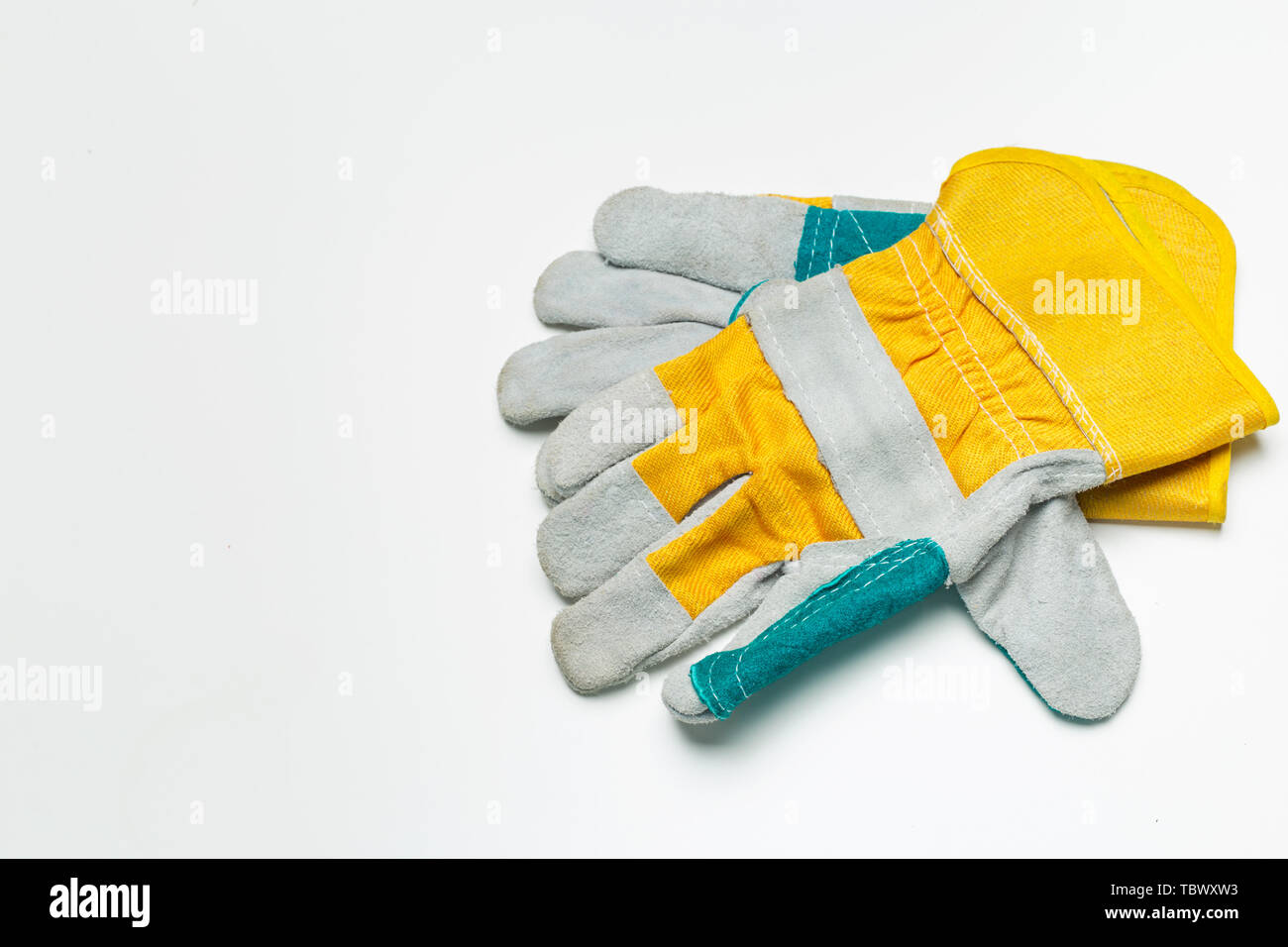 Working mens gloves isolated on white background Stock Photo