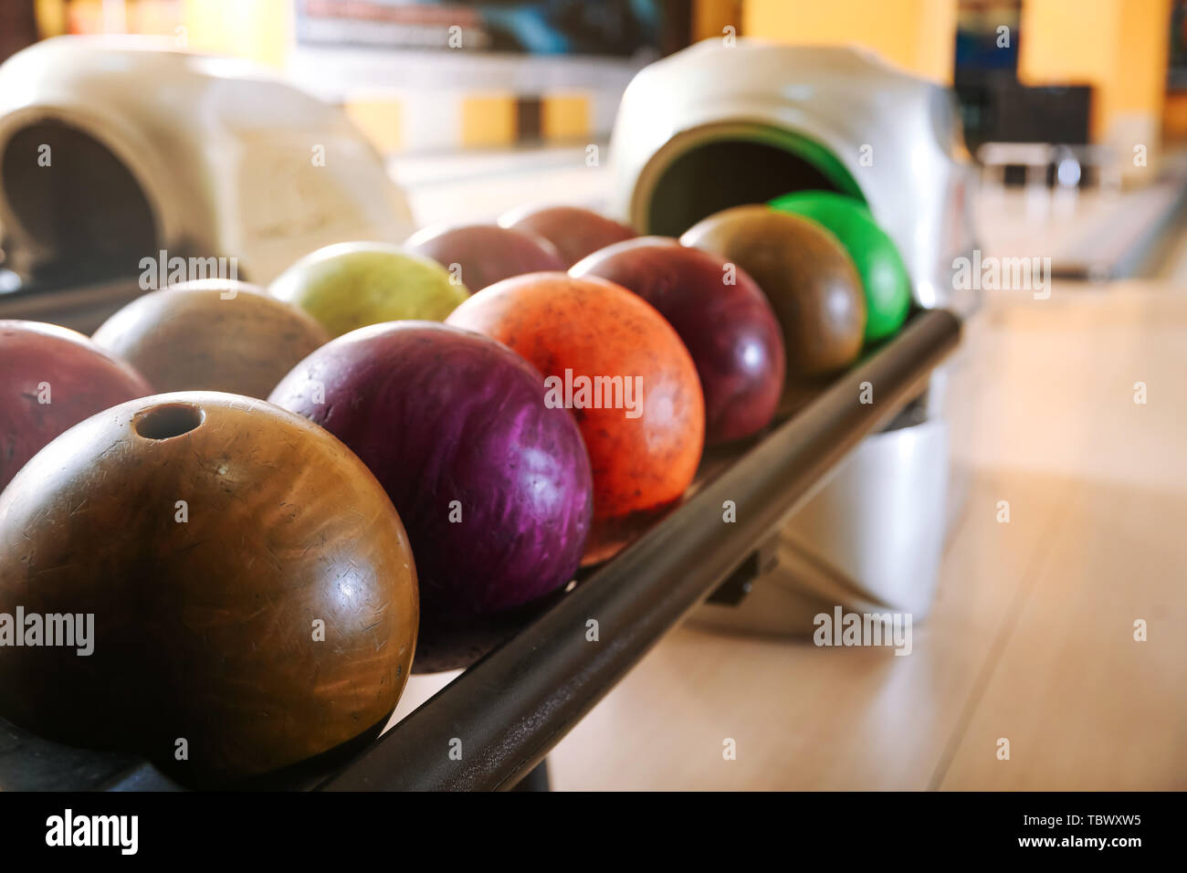 Stand with balls in bowling club Stock Photo Alamy