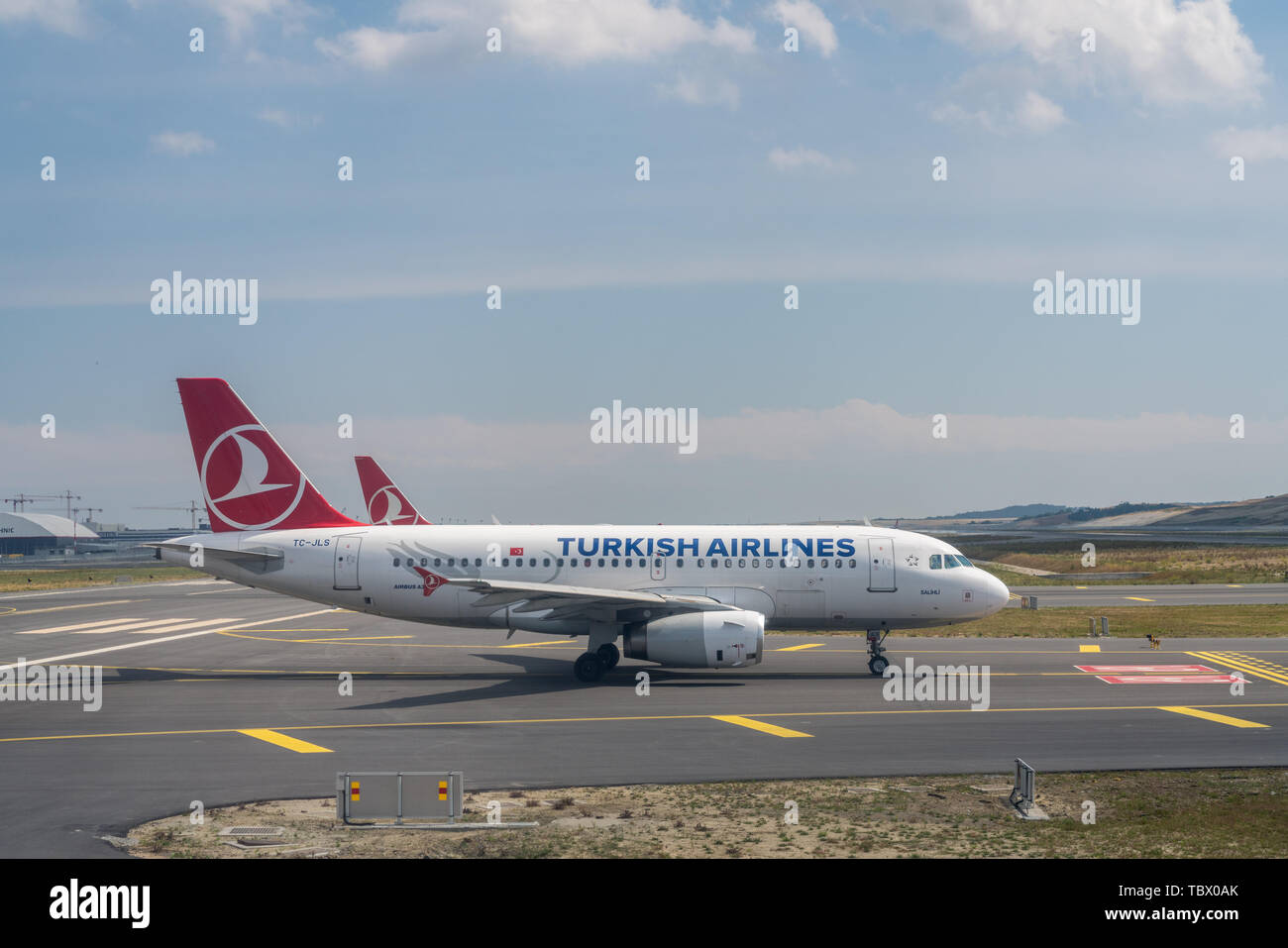 Turkish Airlines planes queue for takeoff at Istanbul Airport in Turkey Stock Photo
