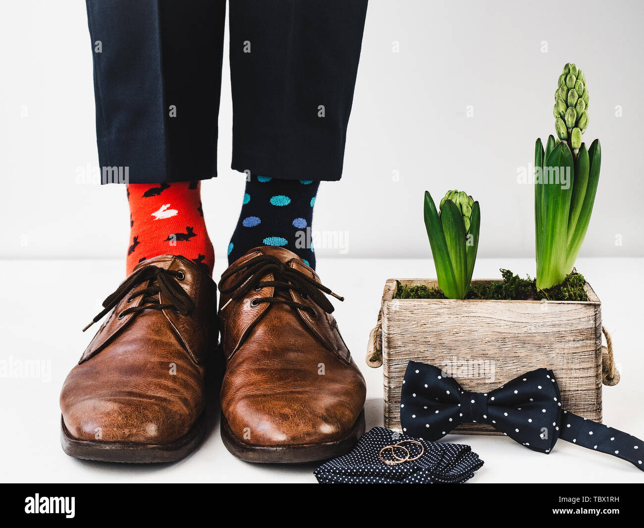 Office manager standing in stylish shoes, black pants and bright ...