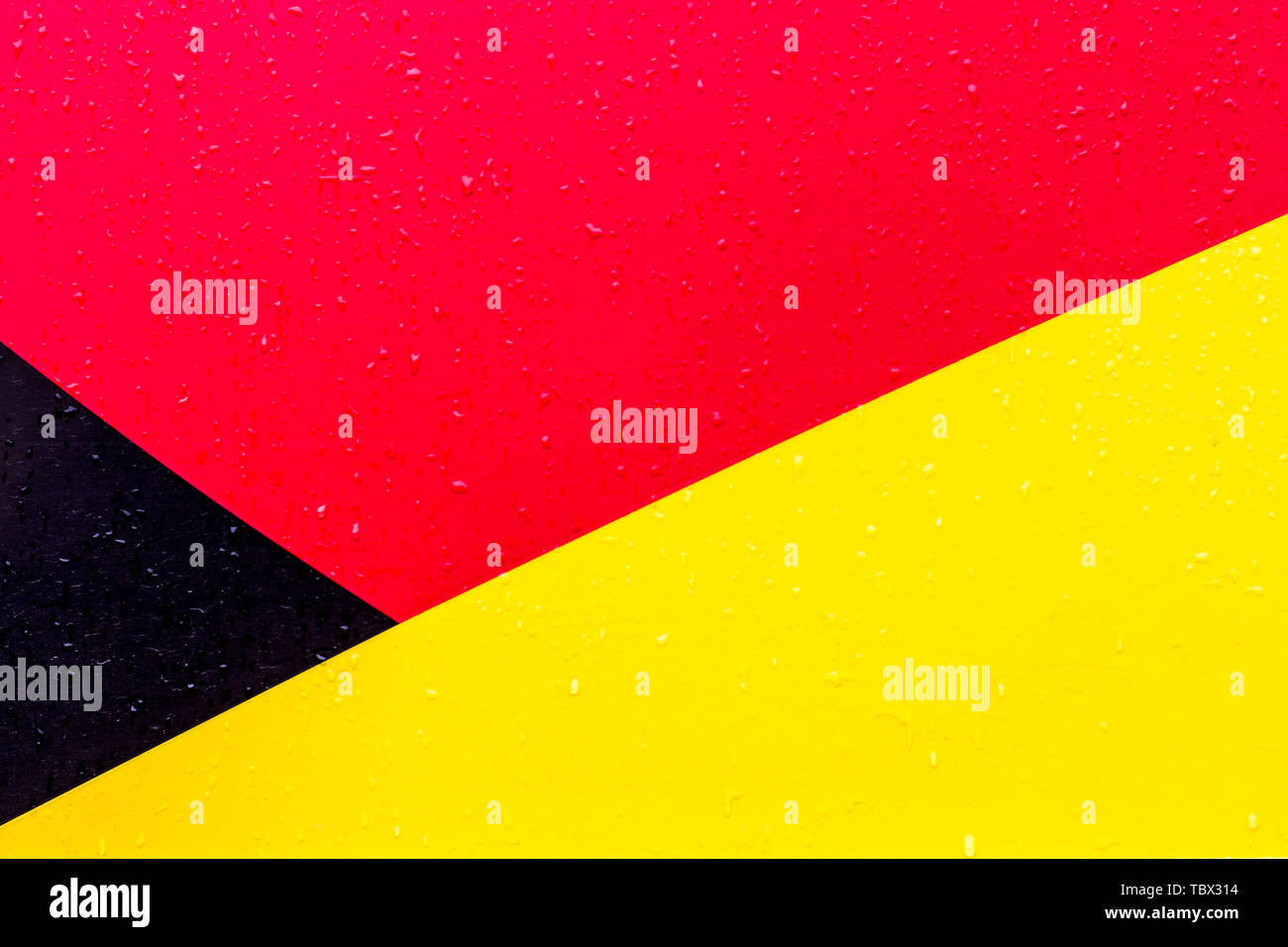 The background is black red yellow. Figures of different colors. The