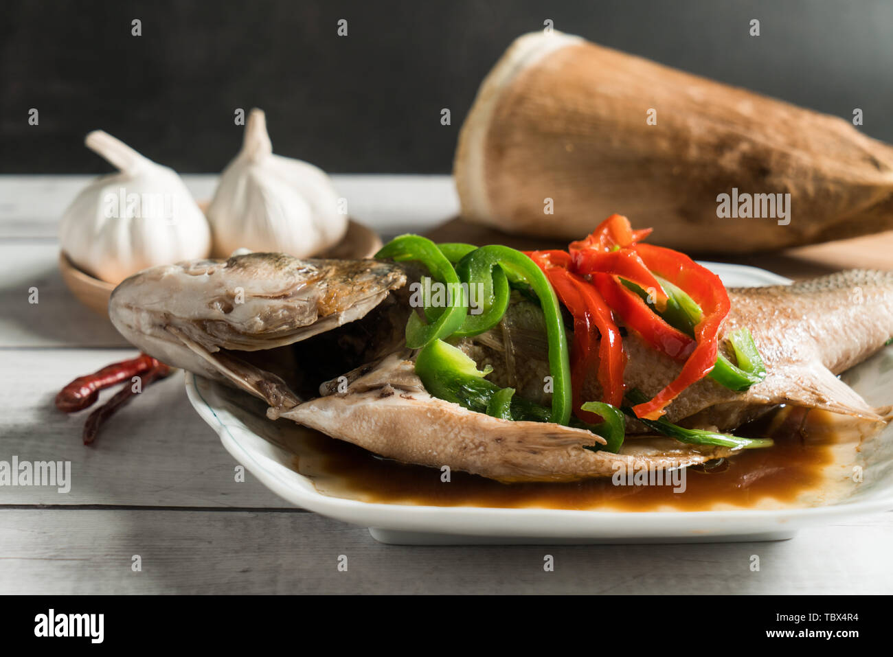 Steamed sea bass, traditional Cantonese cuisine Stock Photo Alamy