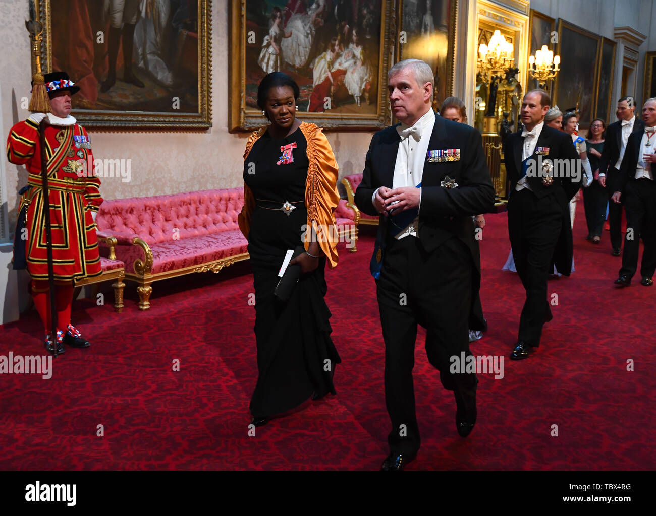 Dame Vivien Hunt and the Duke of York arrive through the East Gallery during the State Banquet at Buckingham Palace, London, on day one of the US President's three day state visit to the UK. Stock Photo