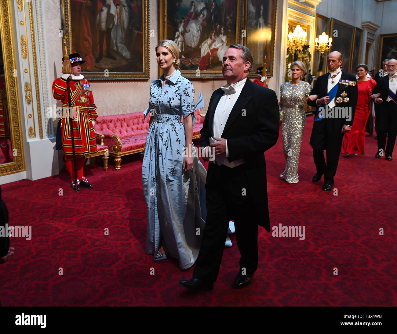 Ivanka Trump and Secretary of State for International Trade, Liam Fox arrive through the East Gallery during the State Banquet at Buckingham Palace, London, on day one of the US President's three day state visit to the UK. Stock Photo