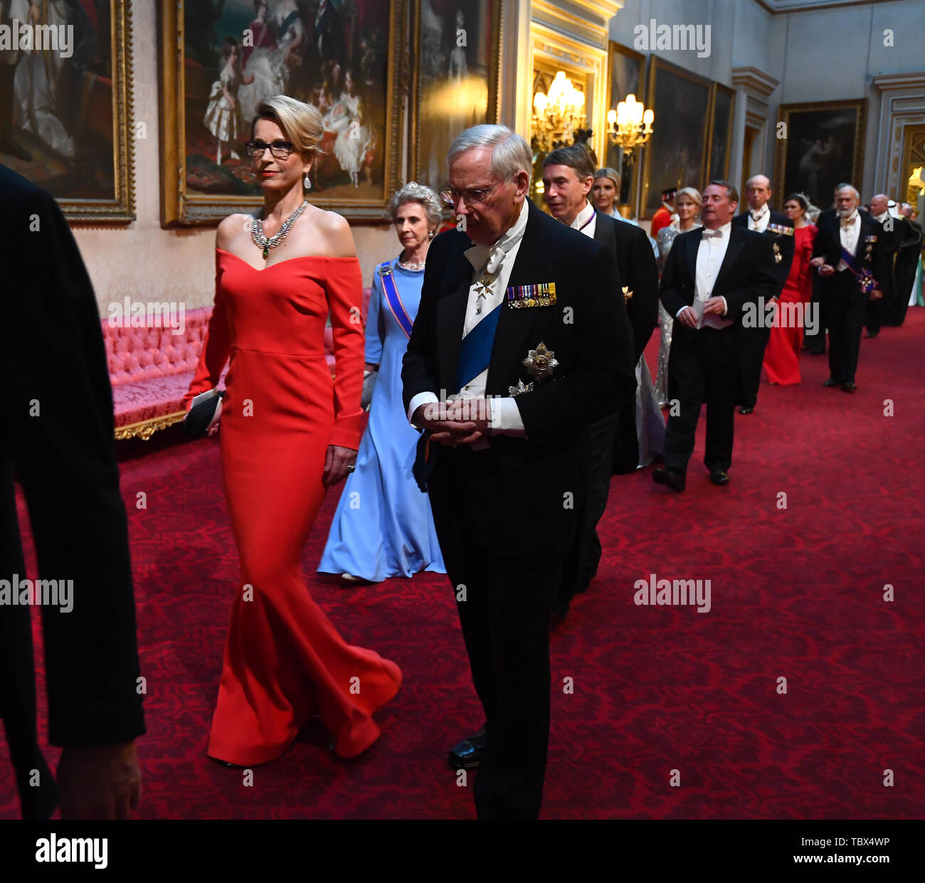 Ms Emma Walmsley and the Duke of Gloucester arrive through the East Gallery during the State Banquet at Buckingham Palace, London, on day one of the US President's three day state visit to the UK. Stock Photo