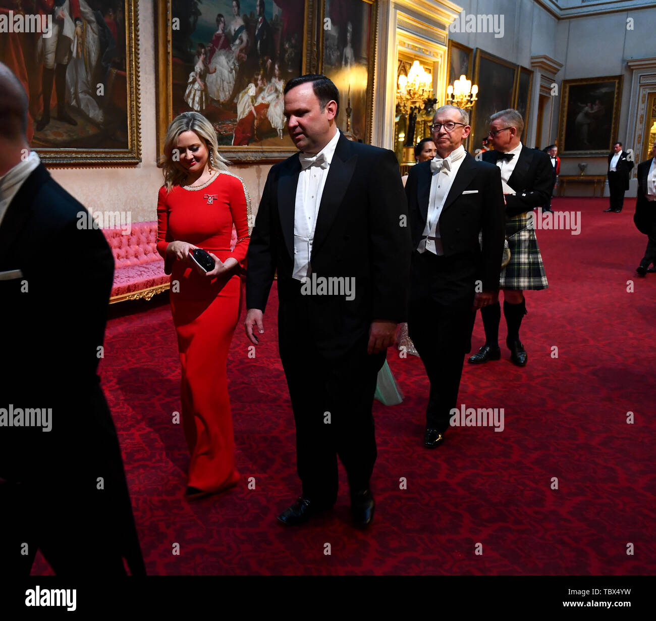 Kathryn Parsons and Daniel Scavino arrive through the East Gallery during the State Banquet at Buckingham Palace, London, on day one of the US President's three day state visit to the UK. Stock Photo
