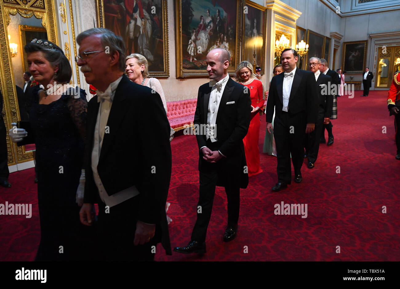 The Countess Peel and Stephen Miller arrive through the East Gallery during the State Banquet at Buckingham Palace, London, on day one of the US President's three day state visit to the UK. Stock Photo