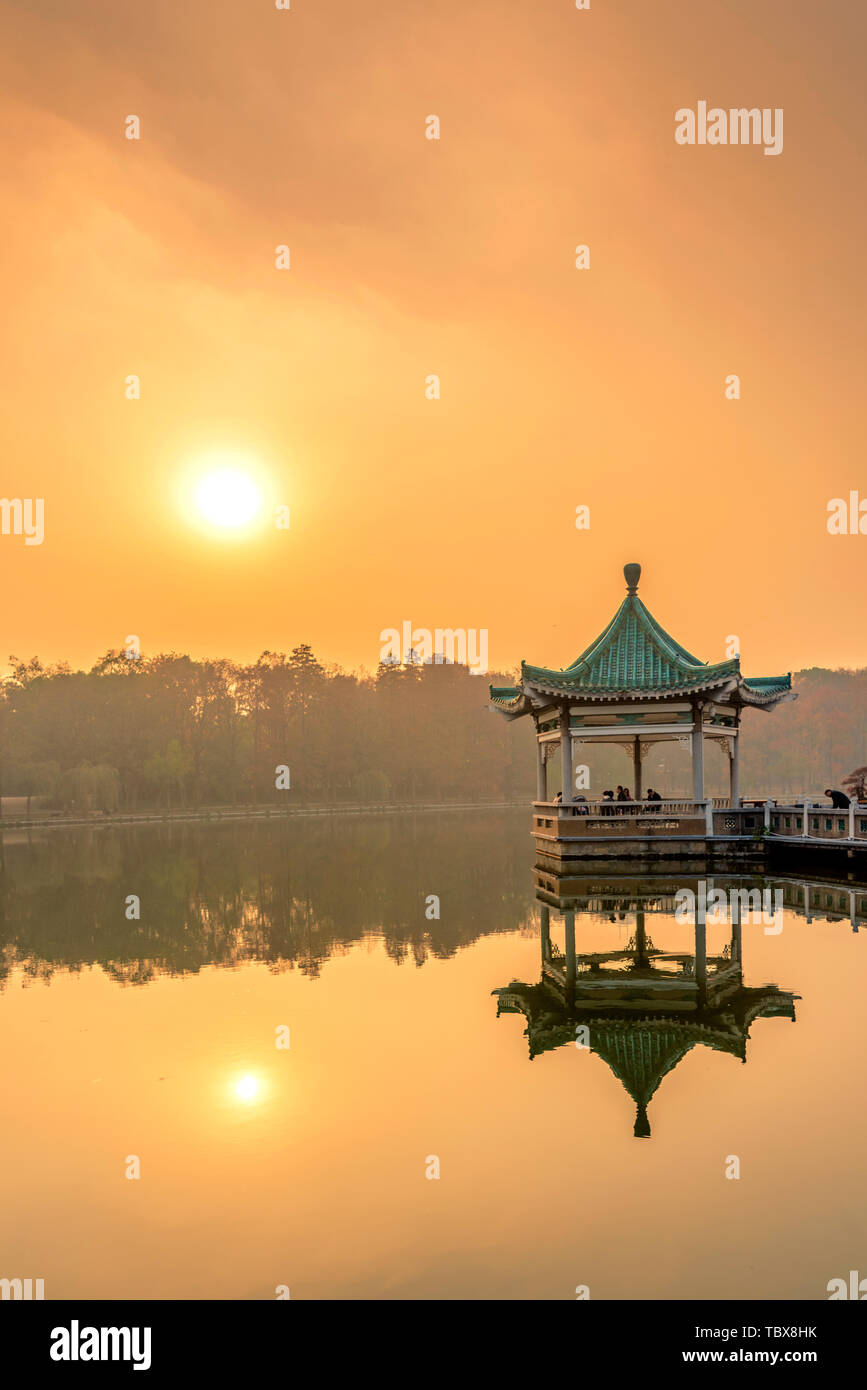 Bitan Watching Fish in East Lake Listening Tao Scenic Area, Wuhan, Hubei Province Stock Photo