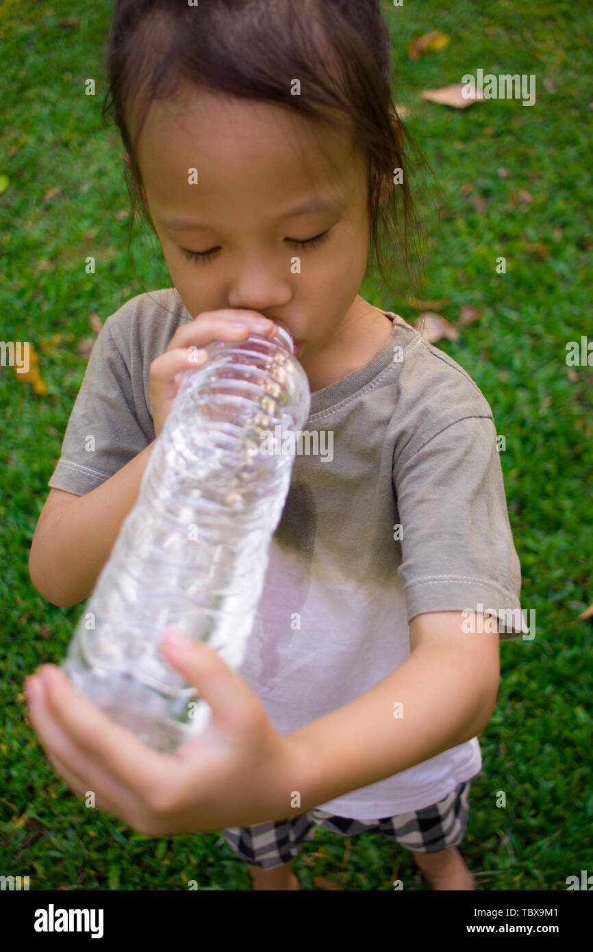 Teen boy drinking water hi-res stock photography and images - Alamy