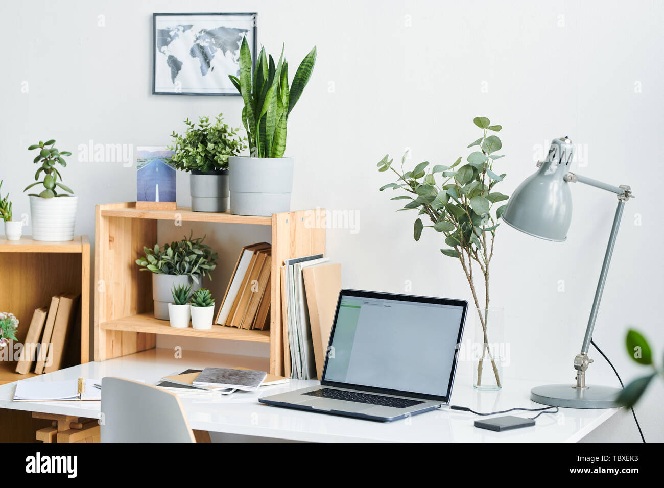 Workplace by wall Stock Photo - Alamy